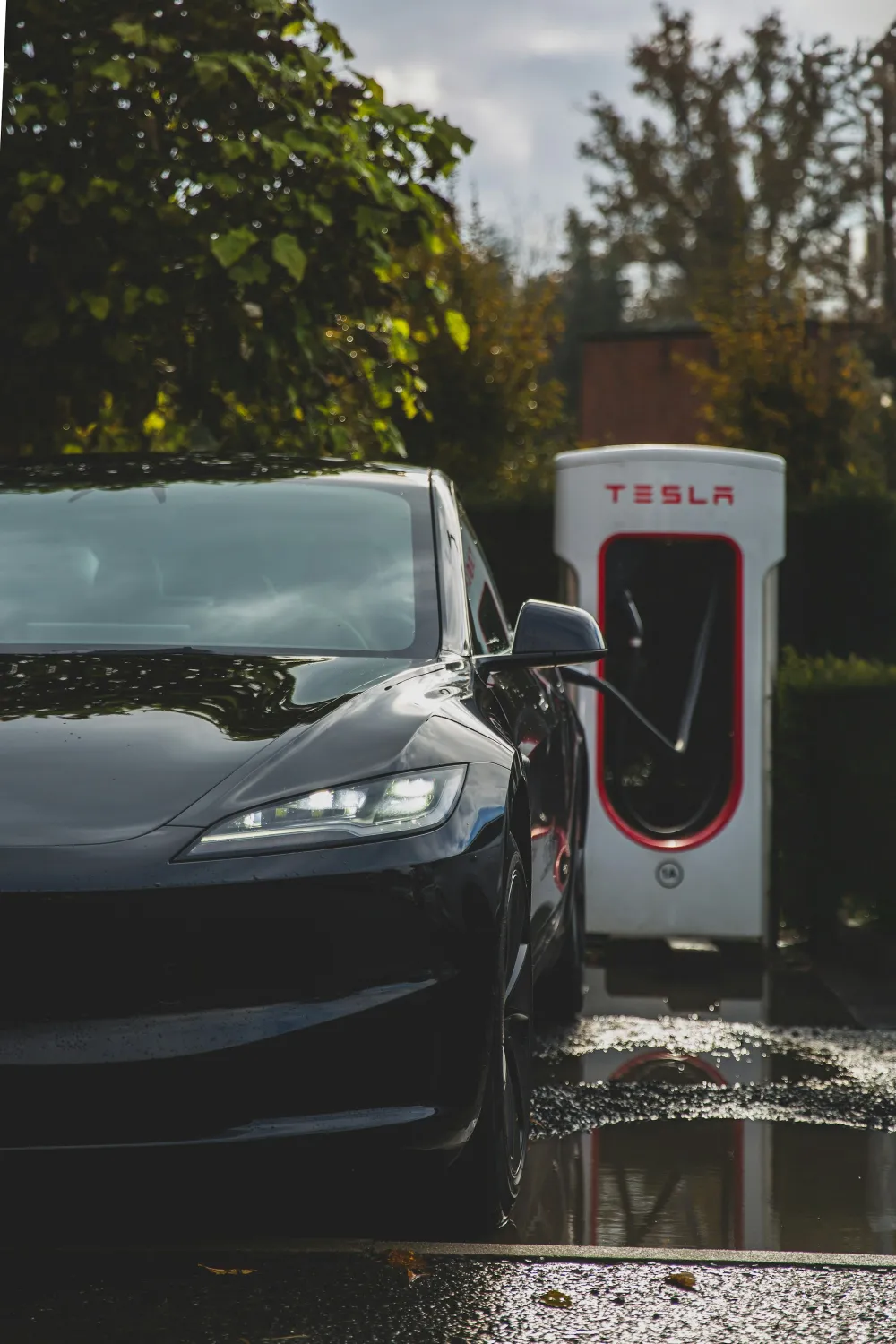A Tesla charging at a Supercharger